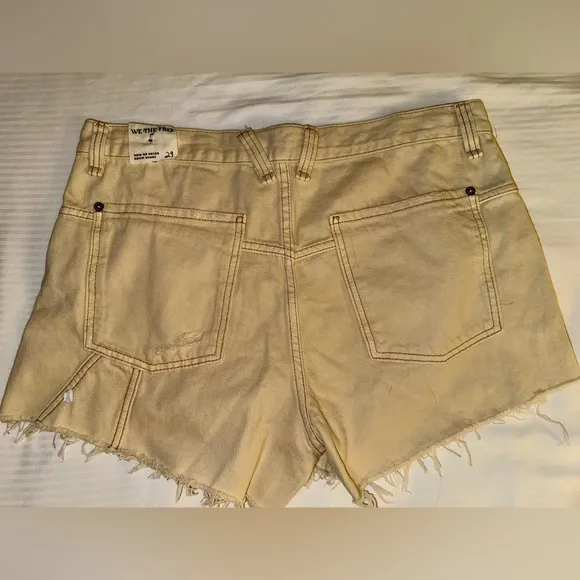FREE PEOPLE Distressed Beige Denim Shorts