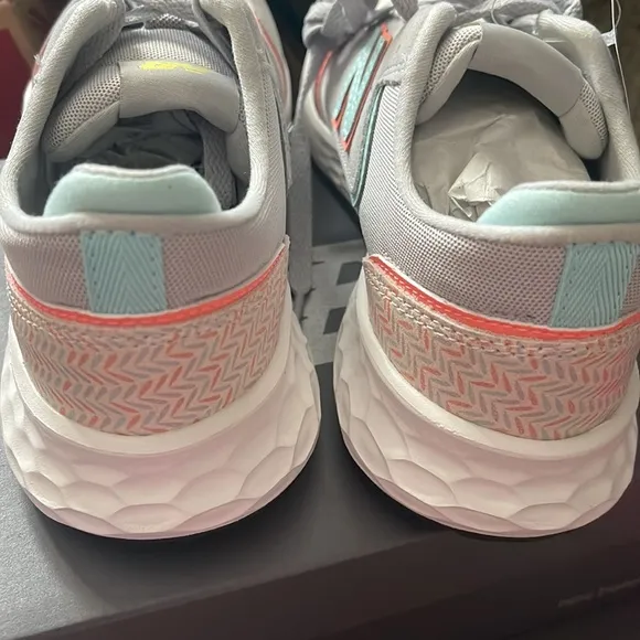 New Balance Big Kid size 4 or a Women’s size 6, Soft Foam Running Shoes.