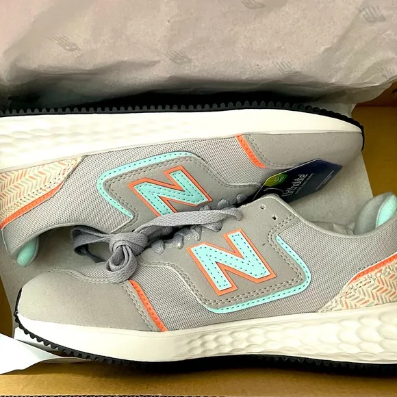 New Balance Big Kid size 4 or a Women’s size 6, Soft Foam Running Shoes.
