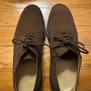 Tod’s Brown Lace-Up Shoes