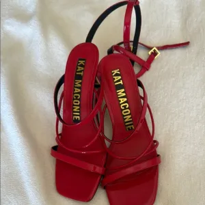 Vibrant Red Heeled Sandals with Adjustable Straps